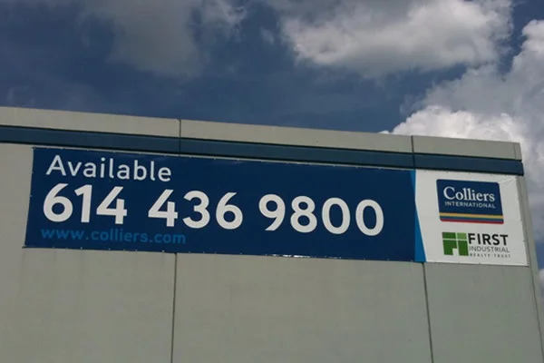 Banner on building completed by Sign Centers
