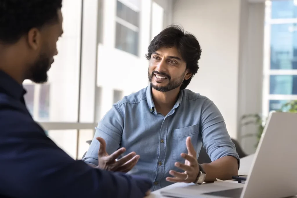 Two people hashing out a business strategy in an intimate meeting.