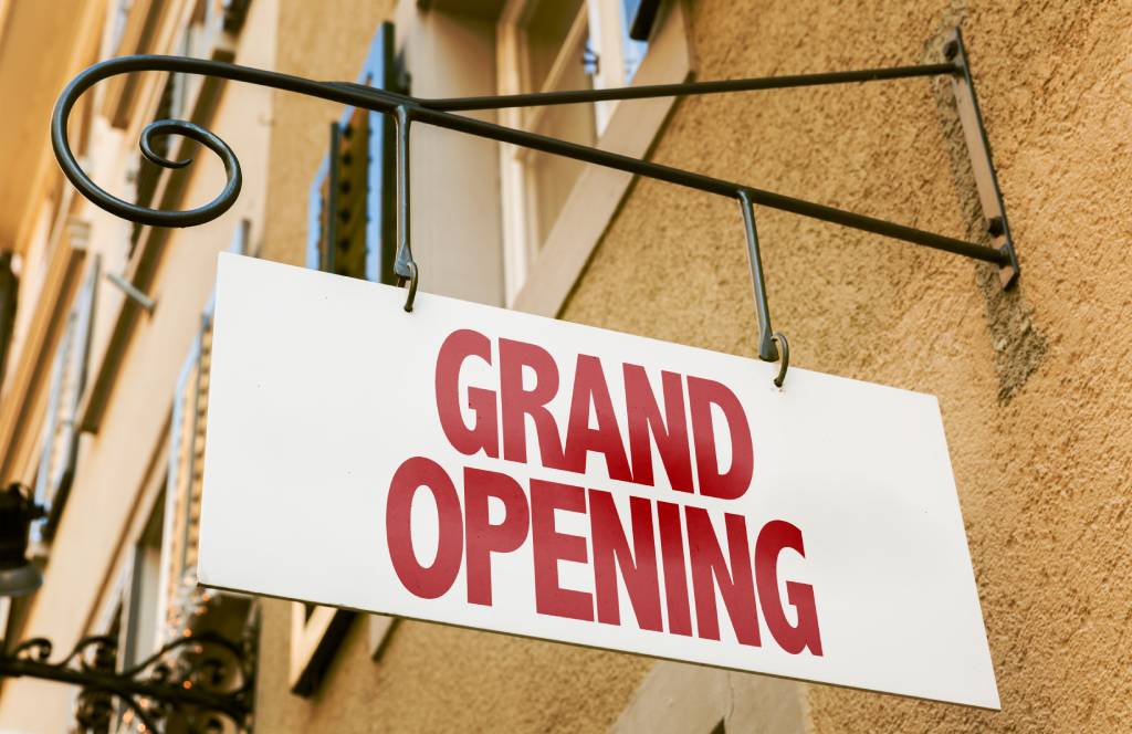 Grand Opening sign in a conceptual image