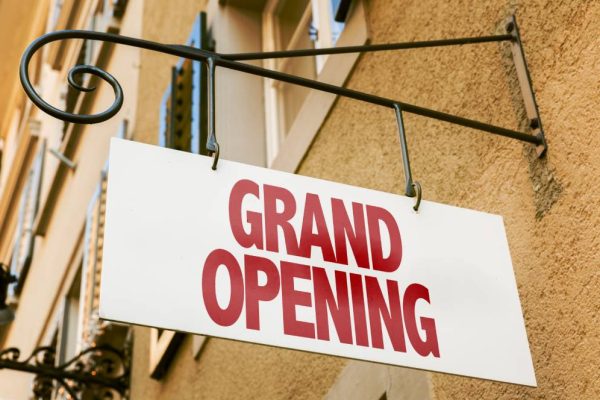 Grand Opening sign in a conceptual image
